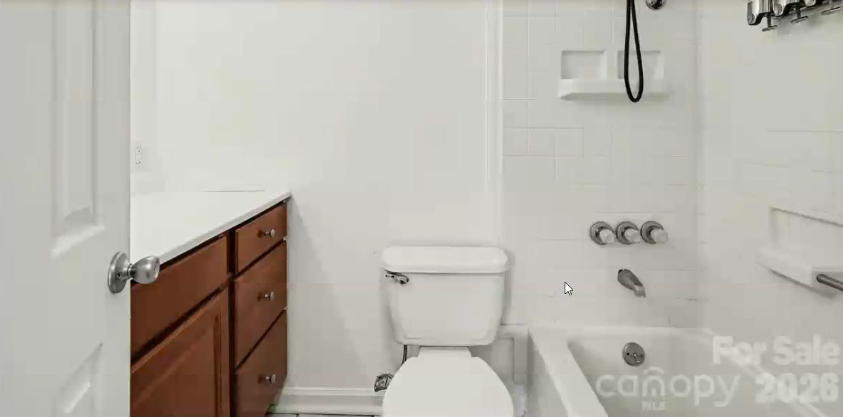 Bright white bathroom with tub