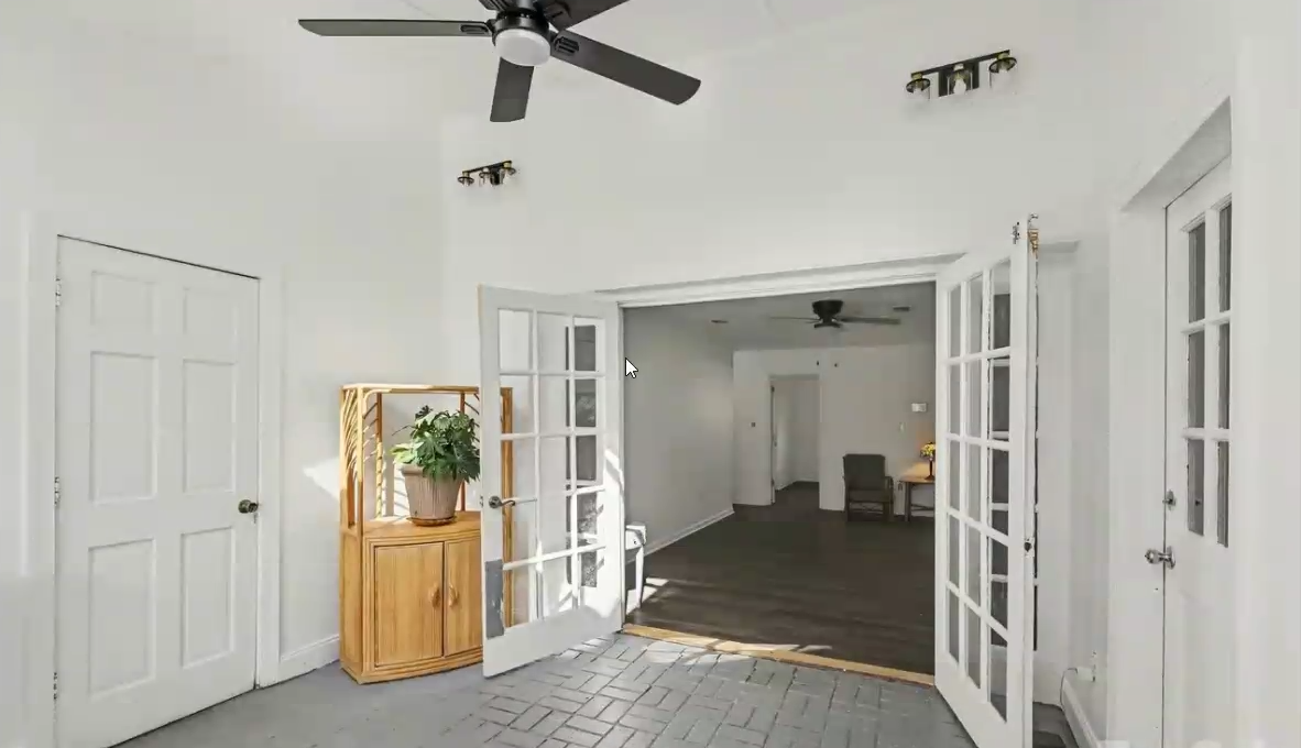Bright sunroom with French doors